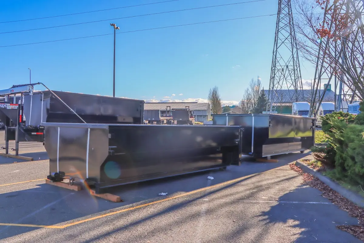 Roll-off dumpster ready for waste disposal at job site for Construction Dumpster Rental in Delhi